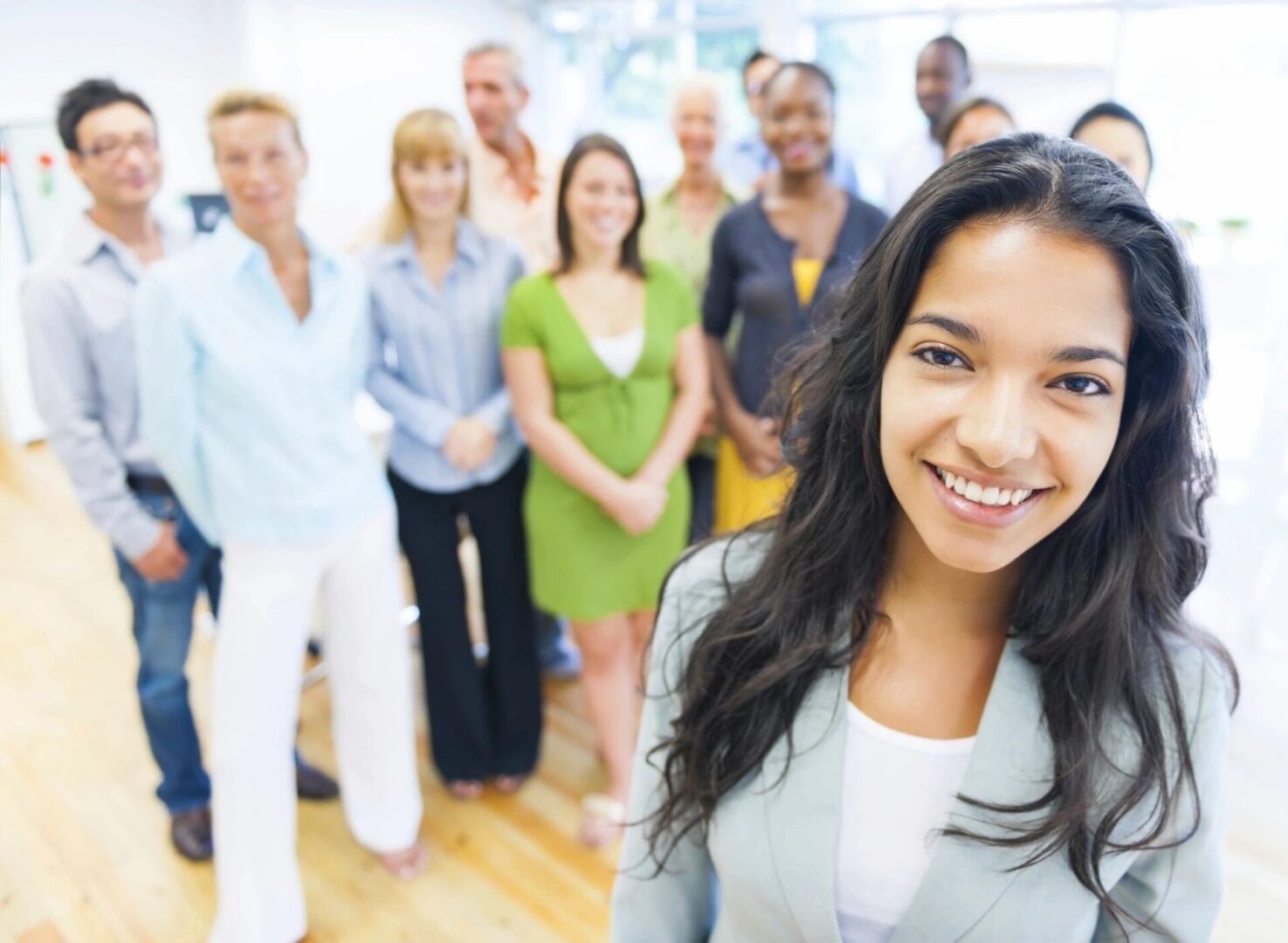 A group of people standing in front of each other.